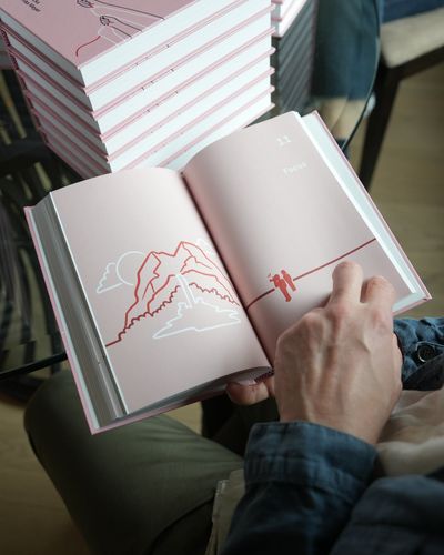 A chapter-opening spread illustrated with a mountain, drawn in one continuous line